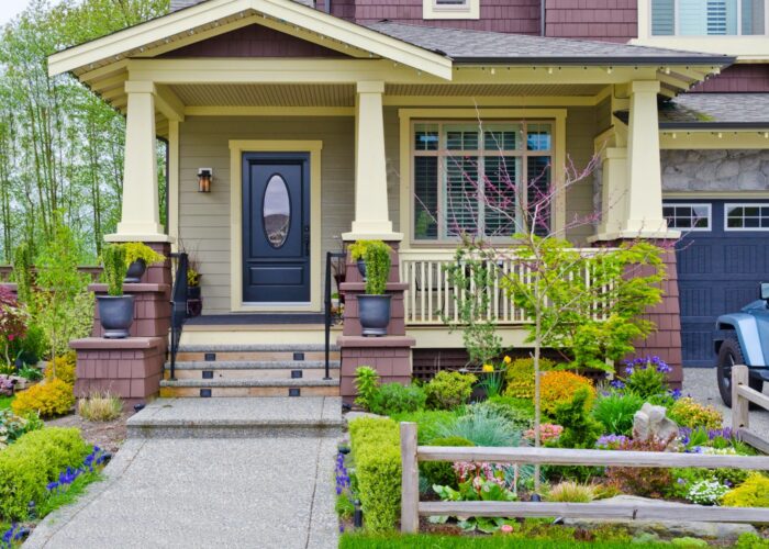 A nice entrance of a luxury house over outdoor landscape