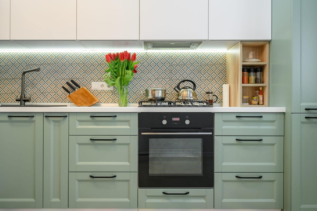 Front,View,Of,Well,Designed,Green-teal,And,White,Modern,Kitchen