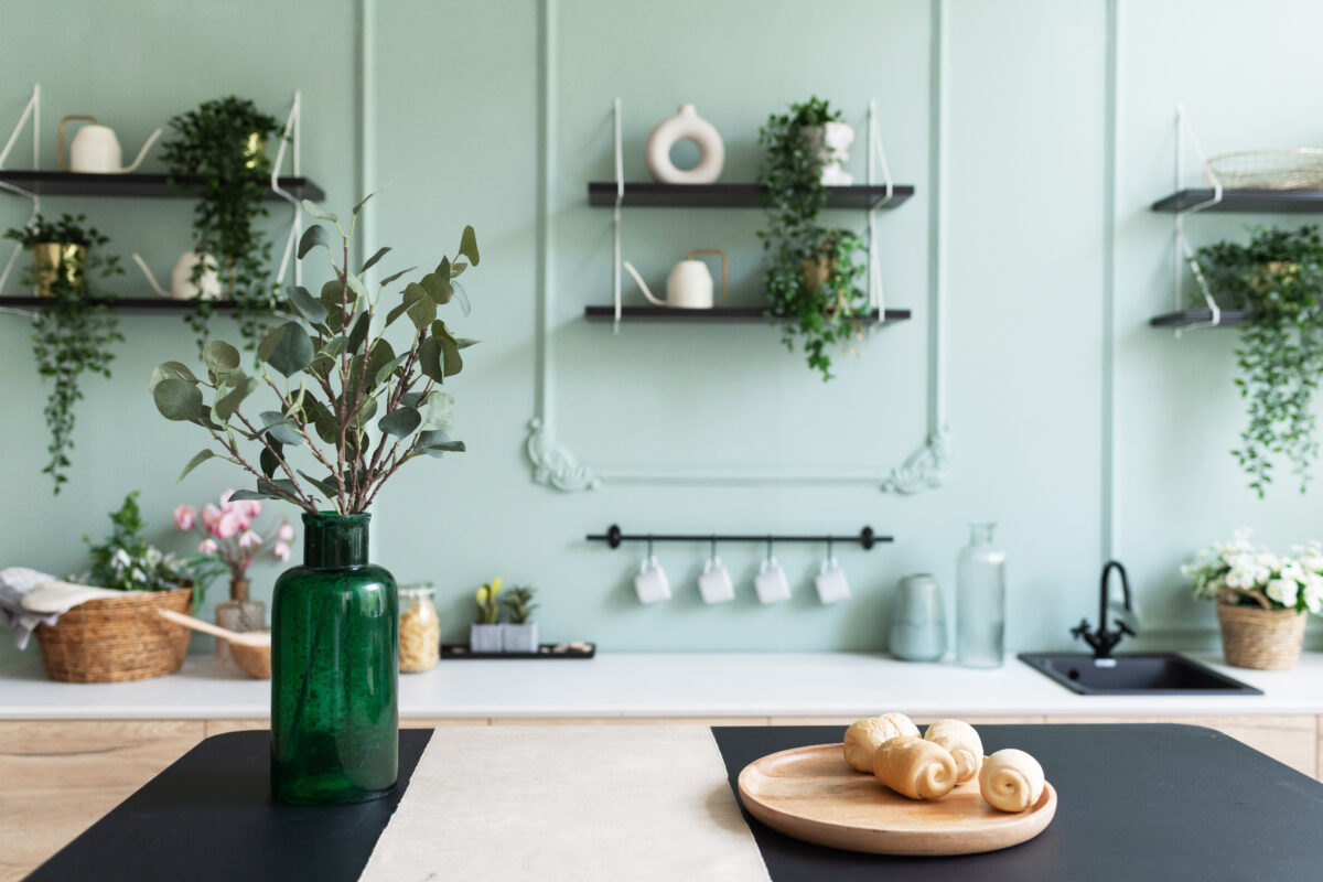 A,Vase,With,Green,Plant,On,A,Table.,Scandinavian,Classic