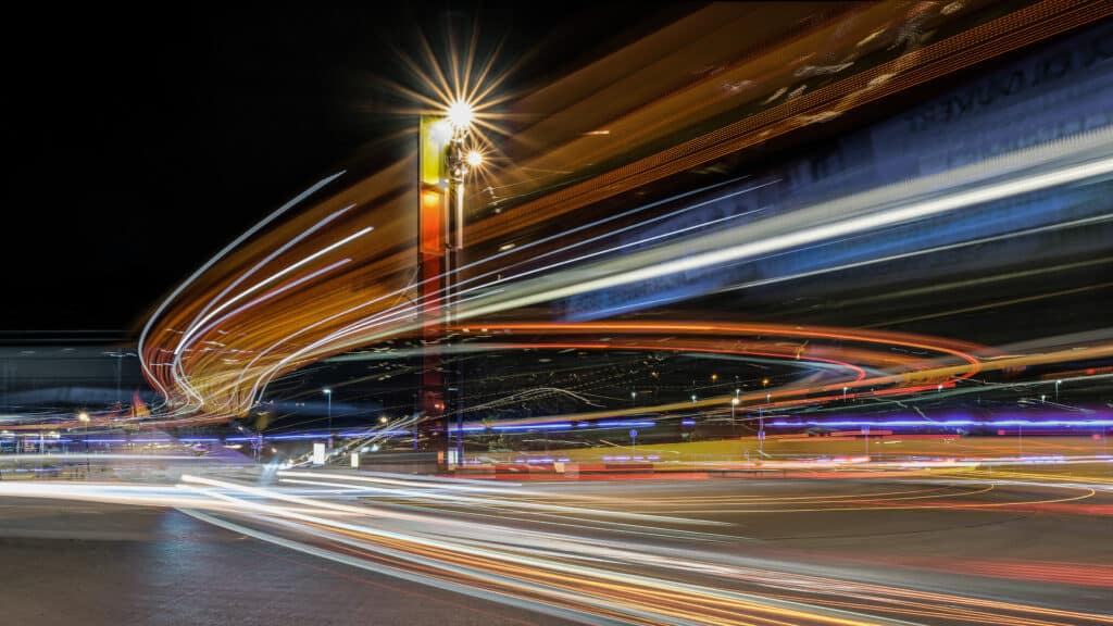 The picture "Bahnhofshektik" is part of my long-term project "Kunst Kreisel - Kreisel-Kunst" (Art Roundabout – Roundabout-Art) and was created in front of the station of Liege, Belgium. For this project I photograph rounadabouts with works of art throughout Europe at dusk with Lighttrails. This series now includes over 50 pictures. A photo book with description of the locations and the artworks is planned.