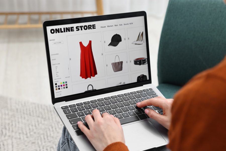 Woman,With,Laptop,Shopping,Online,At,Home,,Closeup Woman with laptop shopping online at home, closeup