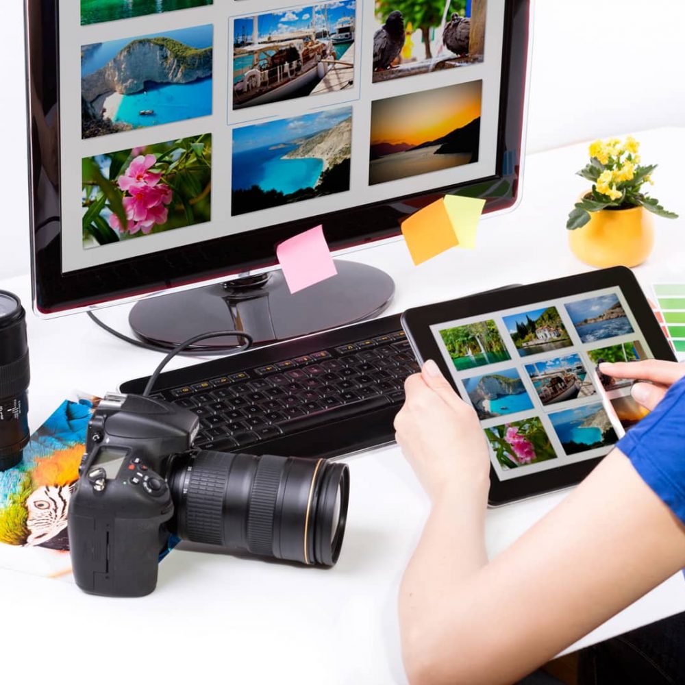 Photo,Editor,Working,On,Computer,And,Used,Graphics,Tablet. Photo editor working on computer and used graphics tablet.