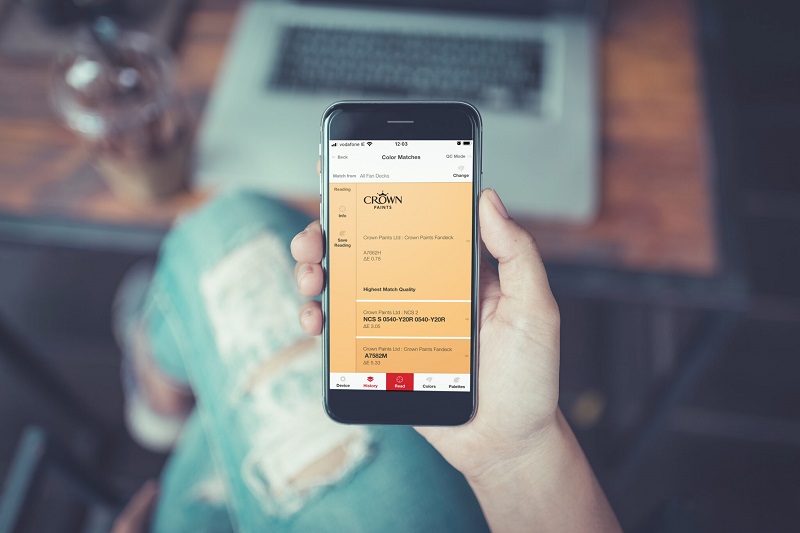 crown paints uses color matching software on cell phone
