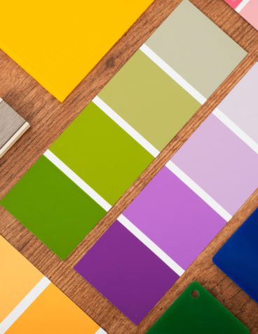 color fandecks and color samples laid out on table