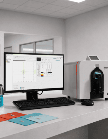 Textile Lab Manager managing colorful fabric within a textile laboratory
